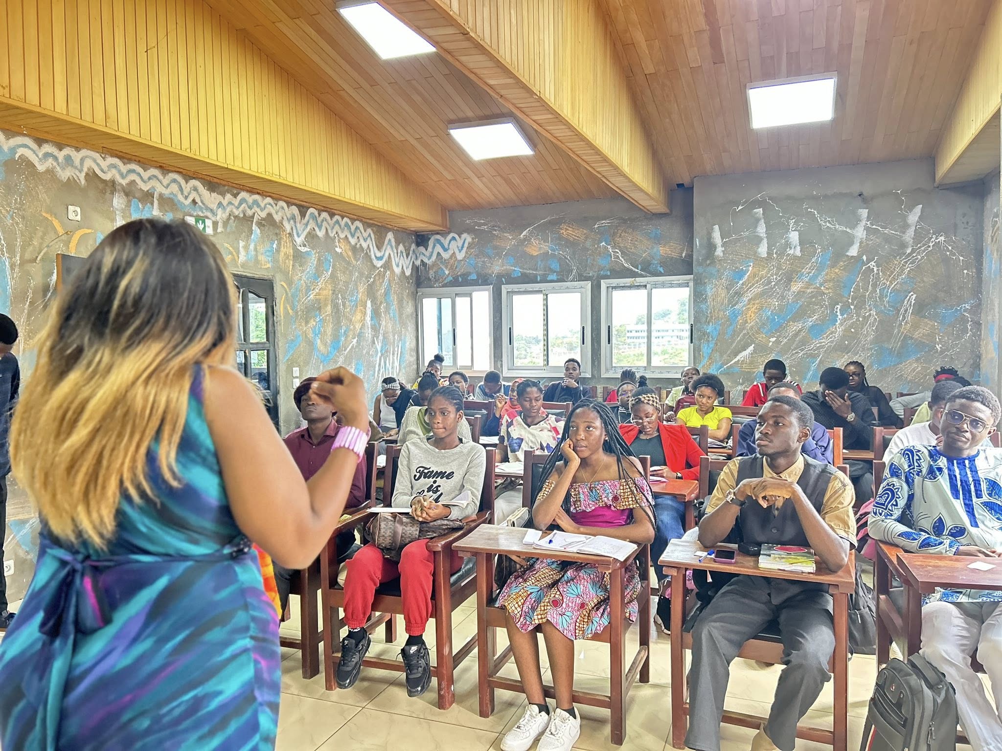 Students listening during a classroom session at a PICHNET learning event.