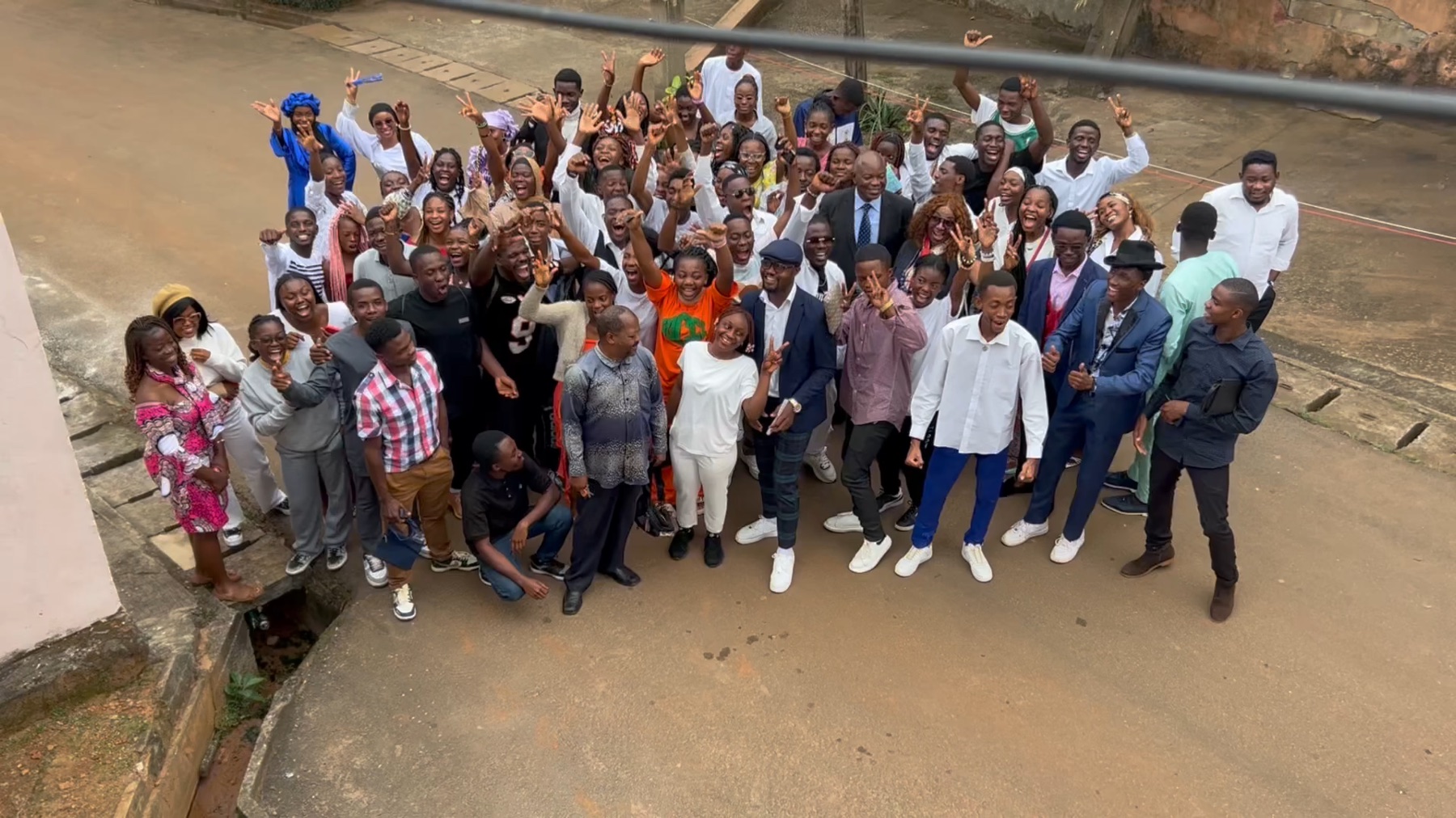 A large PICHNET group gathered outdoors and celebrating together.